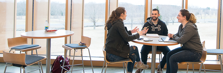 MWCC students chatting in the Science Center