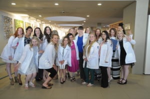 Group of Dental students in their white jackets