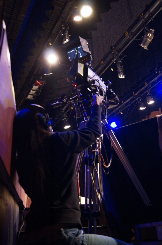 Media Arts & Technology - Video Student Using a Camera
