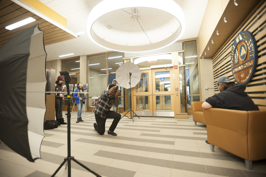 Media Arts & Technology - Photography Students Taking Photos of Subject in the Hallway