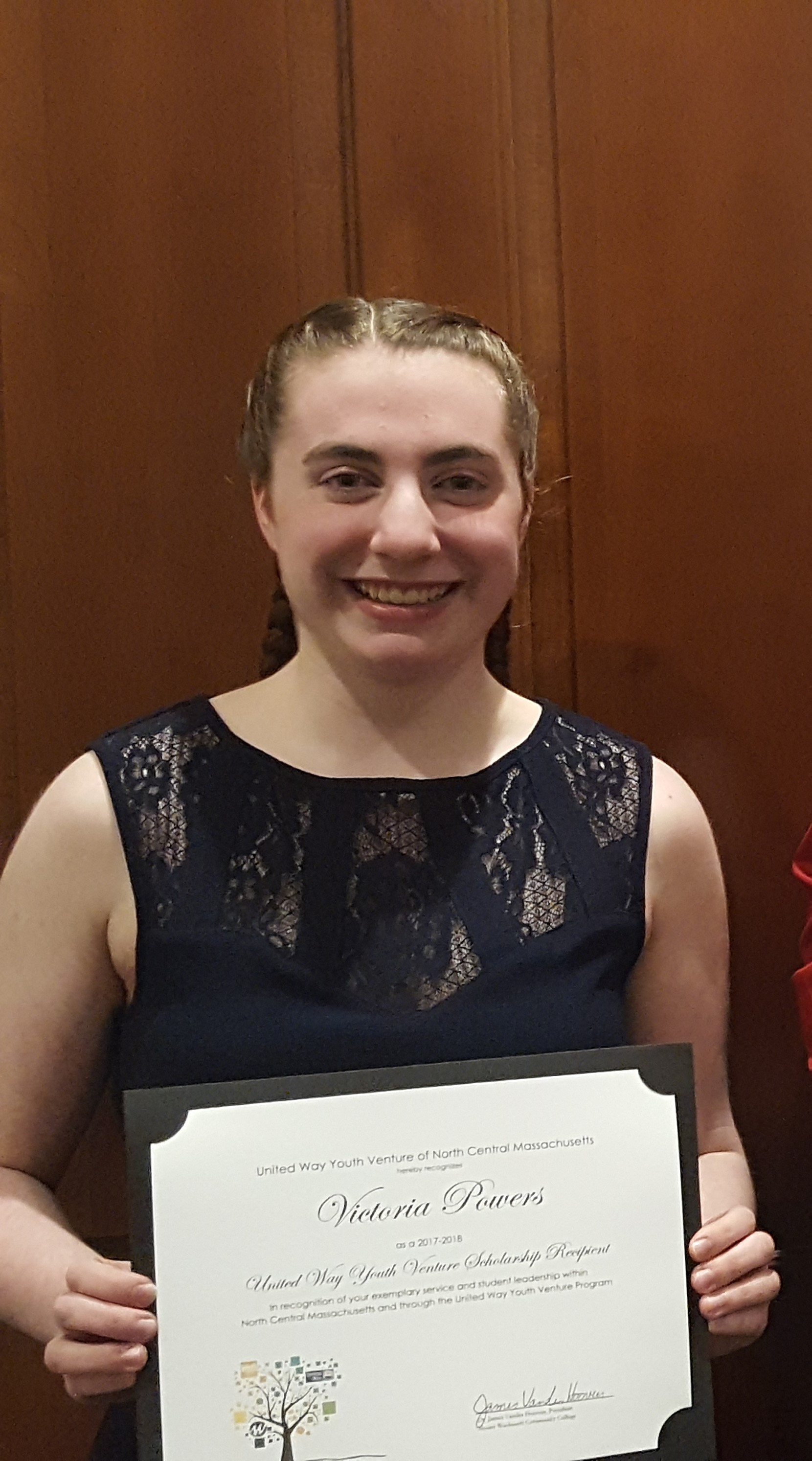 Victoria Powers with her scholarship certificate