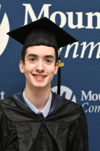 Thomas Sutherland is pictured in his graduation outfit. 