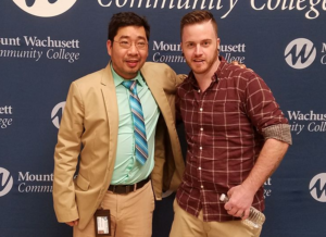 Professor Sunny Nguyen with Peter in front of the MWCC background