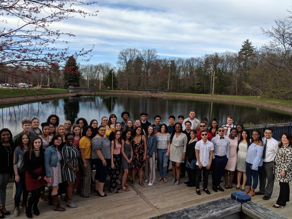 A large group of people poses for a photo.