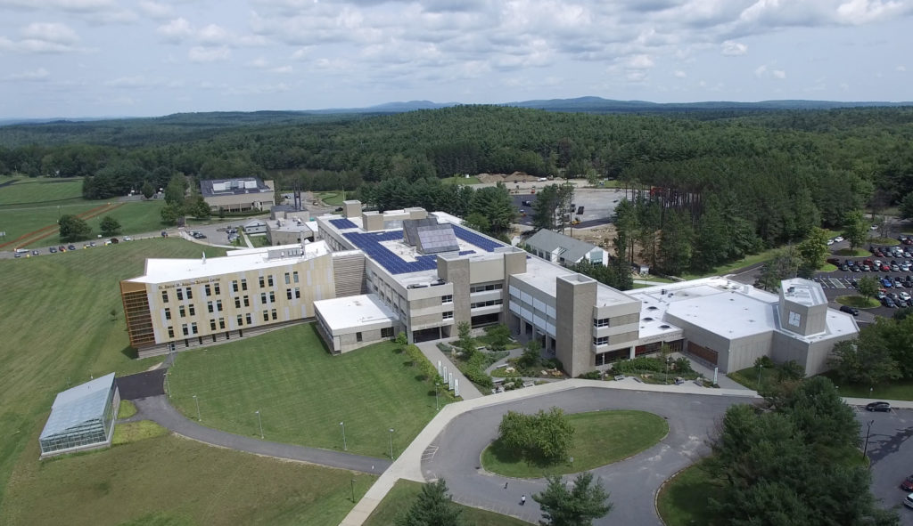 A group of buildings is seen from the air.
