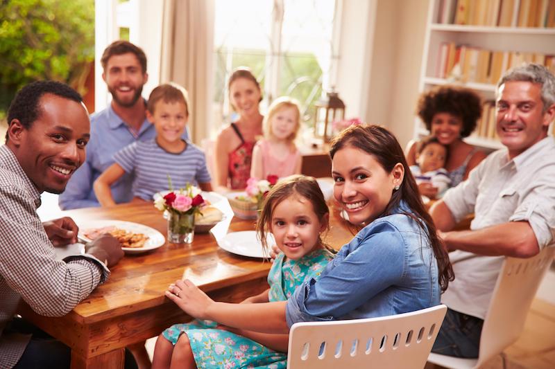 a family sits around a table