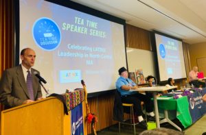 President James Vander Hooven welcomes a panel of Latinx leaders to a Tea Time Speaker Series event at Mount Wachusett Community College.