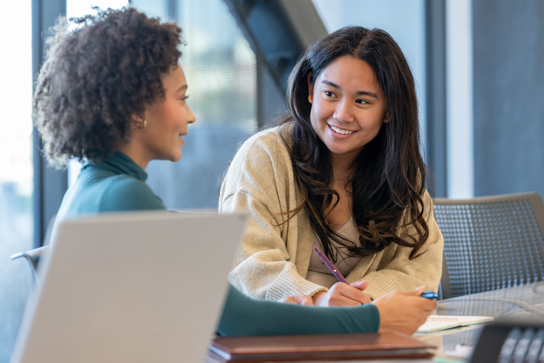 High school students collaborate on homework assignment for STEM education class