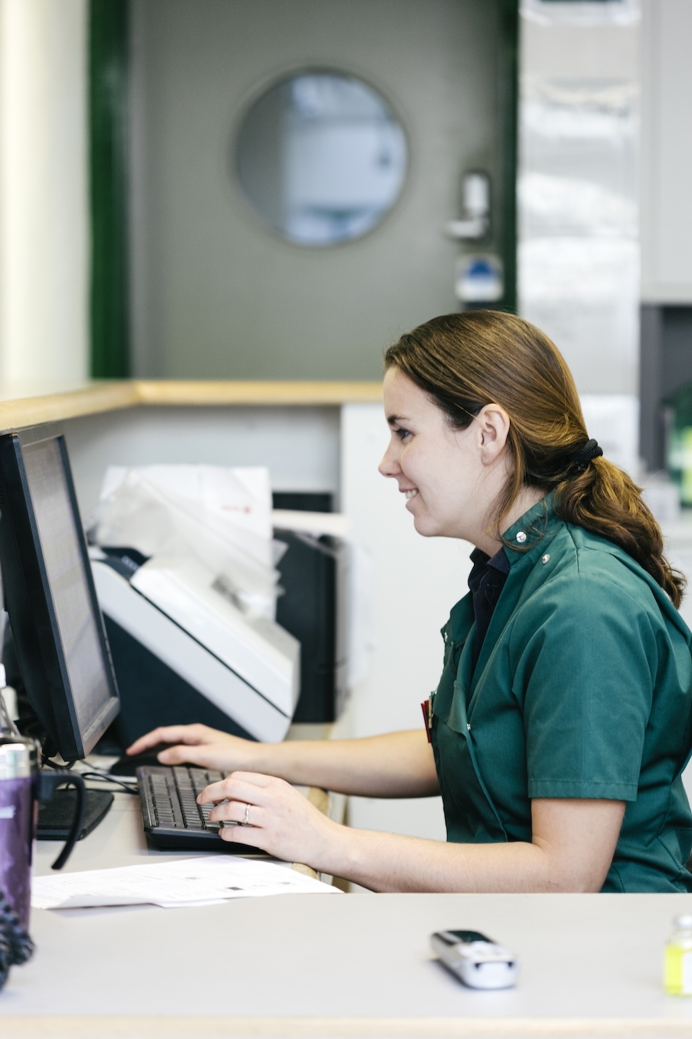 Veterinary Surgeon working on computer