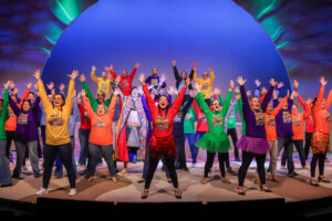 group of performers on stage for joseph and the amazing technicolor dreamcoat