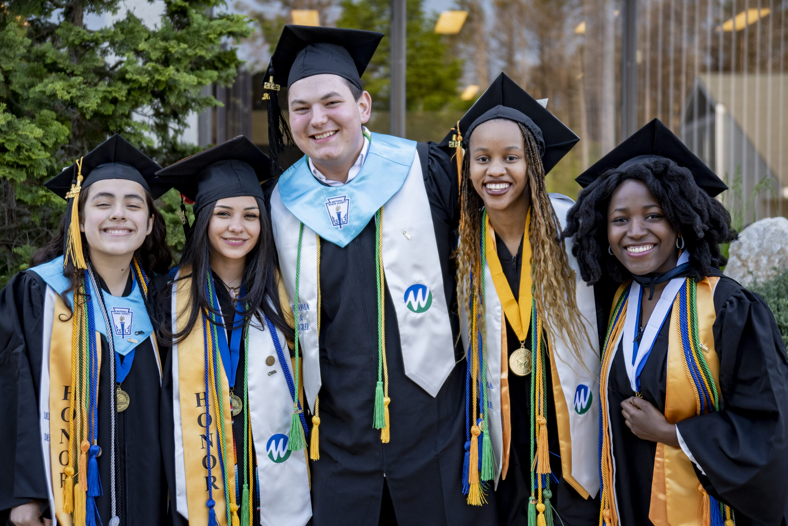 Early College Graduation Awards Diplomas to 57 Students and Associate Degrees to 40 Students