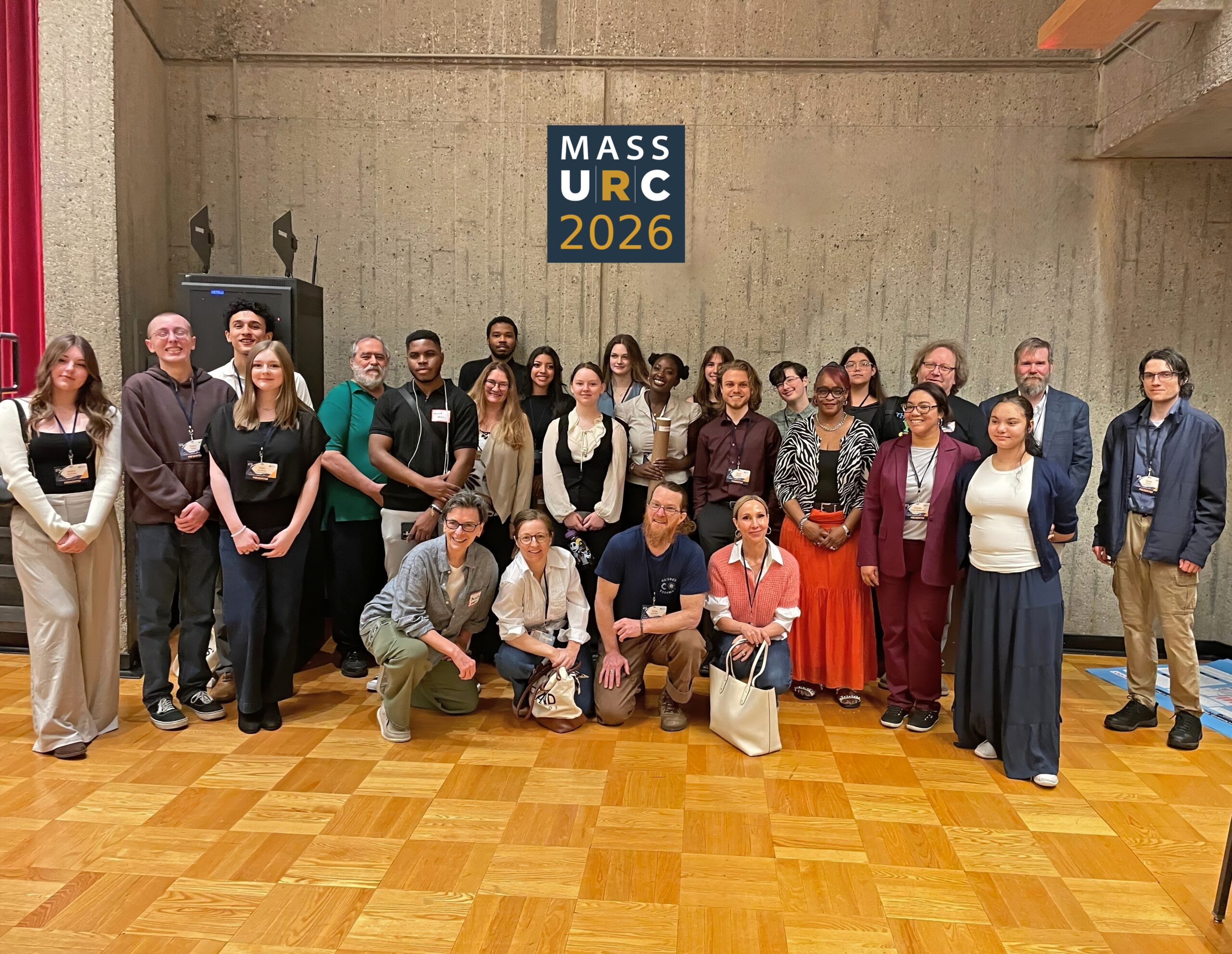 students and faculty at umass research conference