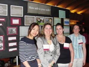 Group of students in front of their presentation