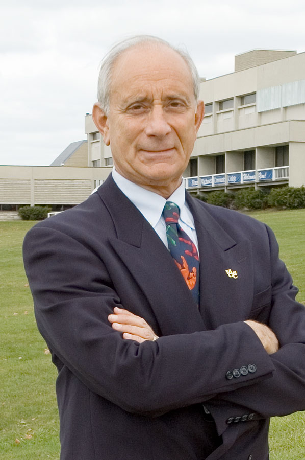 President Daniel M. Asquino in front of the Gardner campus