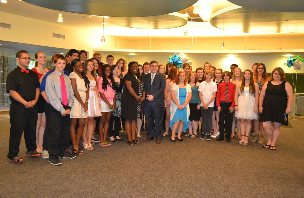 Group photo of the Upward Bound Math and Science students and staff with Rep Jon Zlotnik