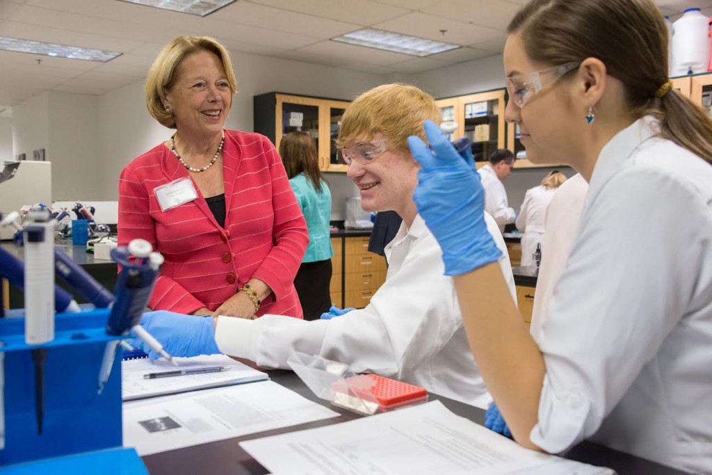 Congresswoman Niki Tsongas speaks with Mount Wachusett Community College biotechnology students Dana Procell and Savannah Cooke during a tour of the college’s Devens campus Monday. The Congresswoman joined state and college officials to celebrate the start of Manufacturing Week.