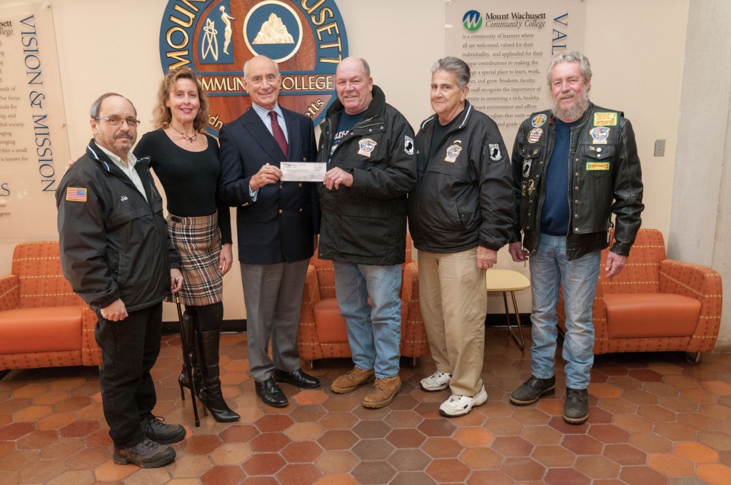 Group of Veterans presenting a check to President Dan Asquino and Carla Zottoli