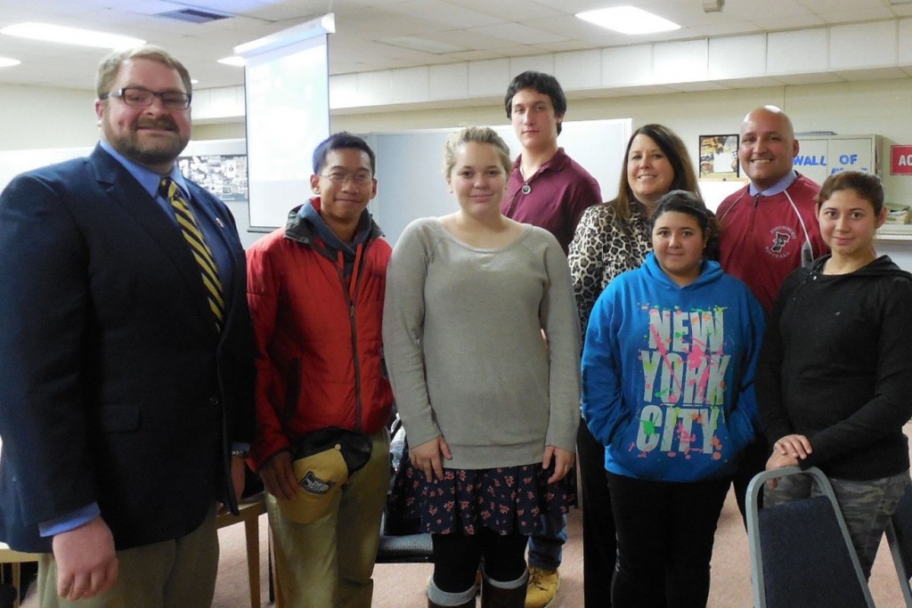 Fitchburg’s School Committee recognized the MWCC/Fitchburg High School GEAR UP partnership during its Nov. 3 meeting. Front row, left to right, GEAR UP Director Andrew Goodwin, GEAR UP 2016/2017 students Keanu Bouthsarath, Sabrina Hyvarinen, Crystal Ocasio, Stephanie Ocasio; back row, Timothy Harkin, Vice President of External Affairs, Communications and K-12 Partnerships Lea Ann Scales, and GEAR UP Assistant Director Victor Rojas. 