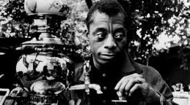 Black and white photo of James Baldwin