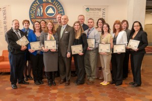 Group of LEAN certificate recipients holding their certificates