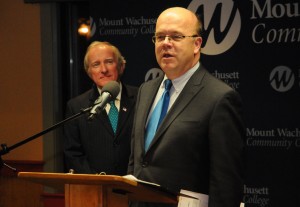 Senator Brewer looks on as Congressman Jim McGovern speaks at the podium