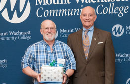 Peter Kaufmann and President Asquino pose with Peter's service award