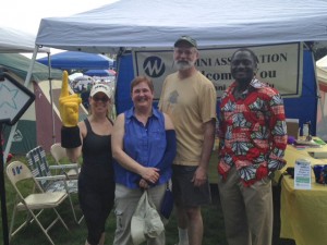 Alumni Network members standing in front of their tent at the Relay for Life