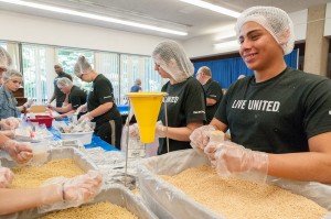 More than 100 students at the Mount packaged 21,078 bags of macaroni and soybeans with a tomato basil sauce for local food banks on Thursday.