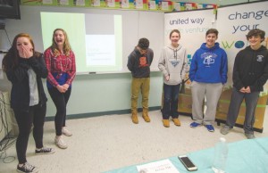 Students from the Youth Venture program react as they learn they have won a $500 grant from the United Way on Thursday afternoon at Samoset Middle School in Leominster. From left are Kimberly Frahey, Justina Vivo Amore, Justice Reynolds, Andrew Chevarie, Anthony Morin and Brenden Joyce. SENTINEL & ENTERPRISE / Ashley Green